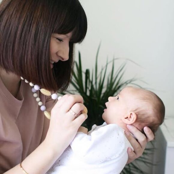 Itzy Ritzy | Teething Happens Chewable Mom Necklace | Pink & Gold - Picture 3 of 8